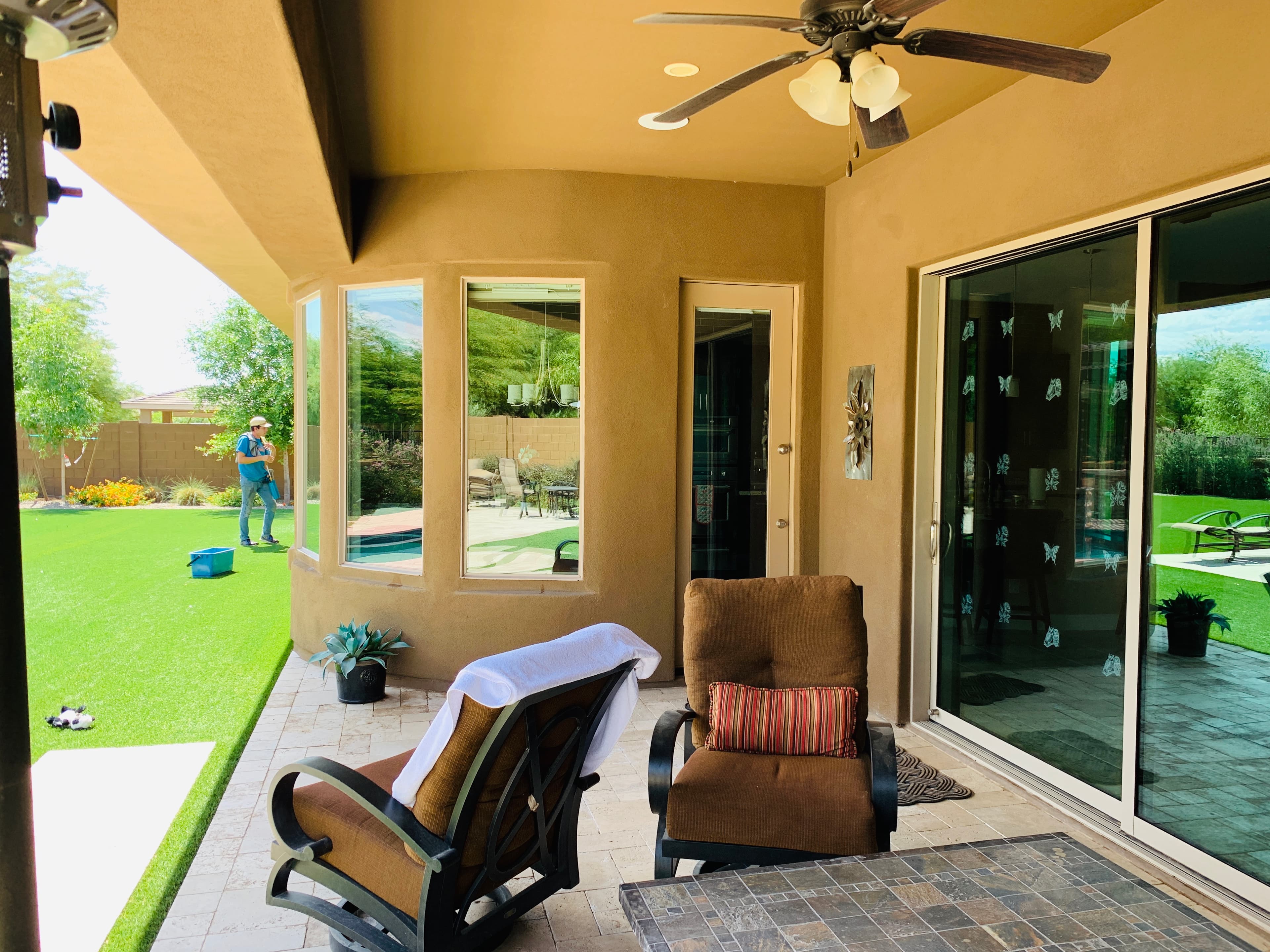 Multi-window Gilbert-area home exterior in Arizona daylight — route service